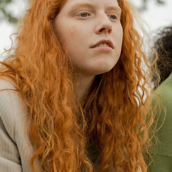 Original photo: woman with long red curly hair